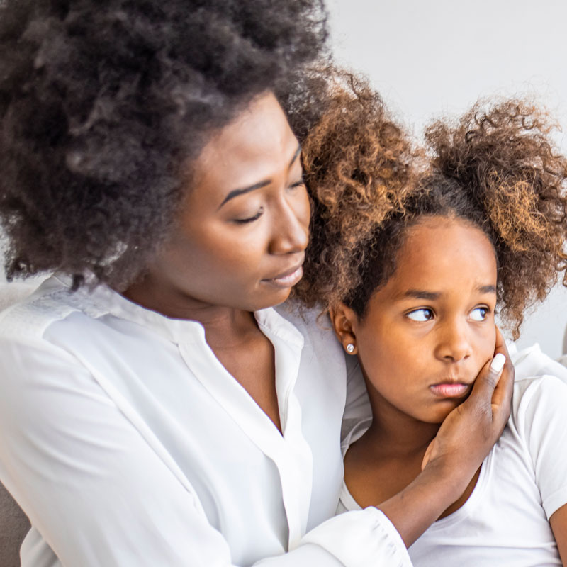 Loving mother consoling or trying make peace with insulted upset stubborn kid daughter avoiding talk, sad sulky resentful girl pouting ignoring caring mom embracing showing support to offended child